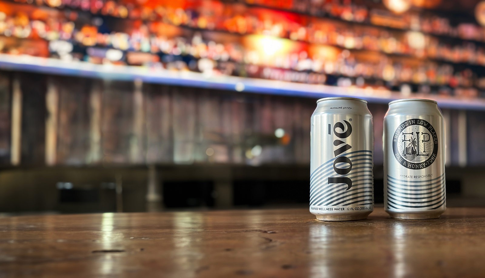 Jovē Water in a can, on a bar